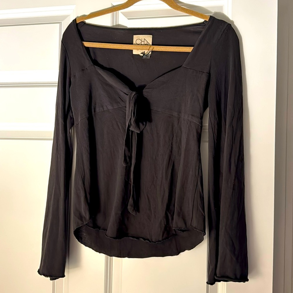 Never worn. Chic and comfortable top.